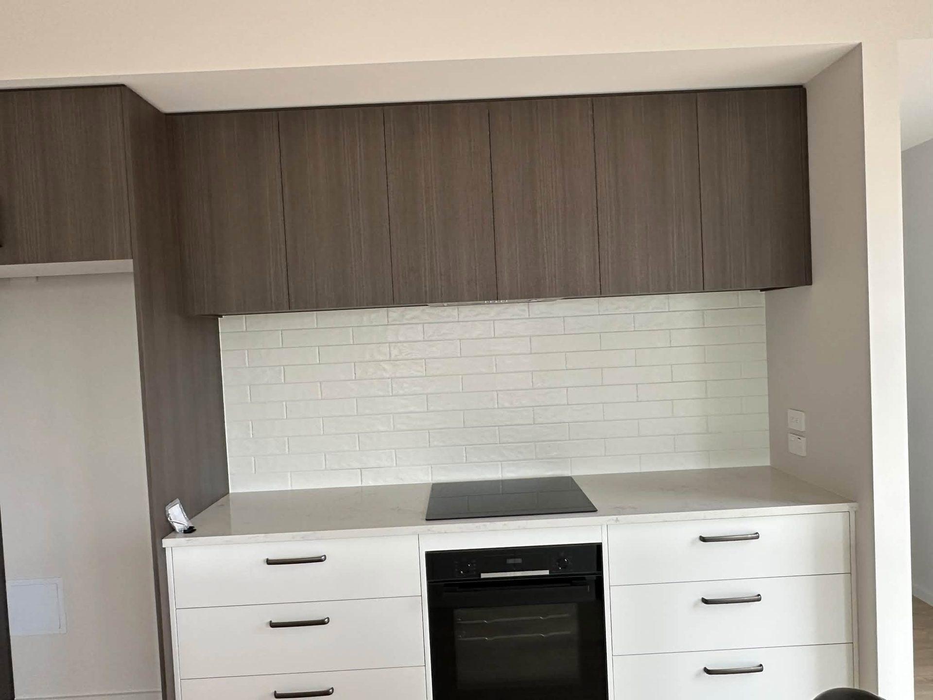 White subway tile kitchen splashback