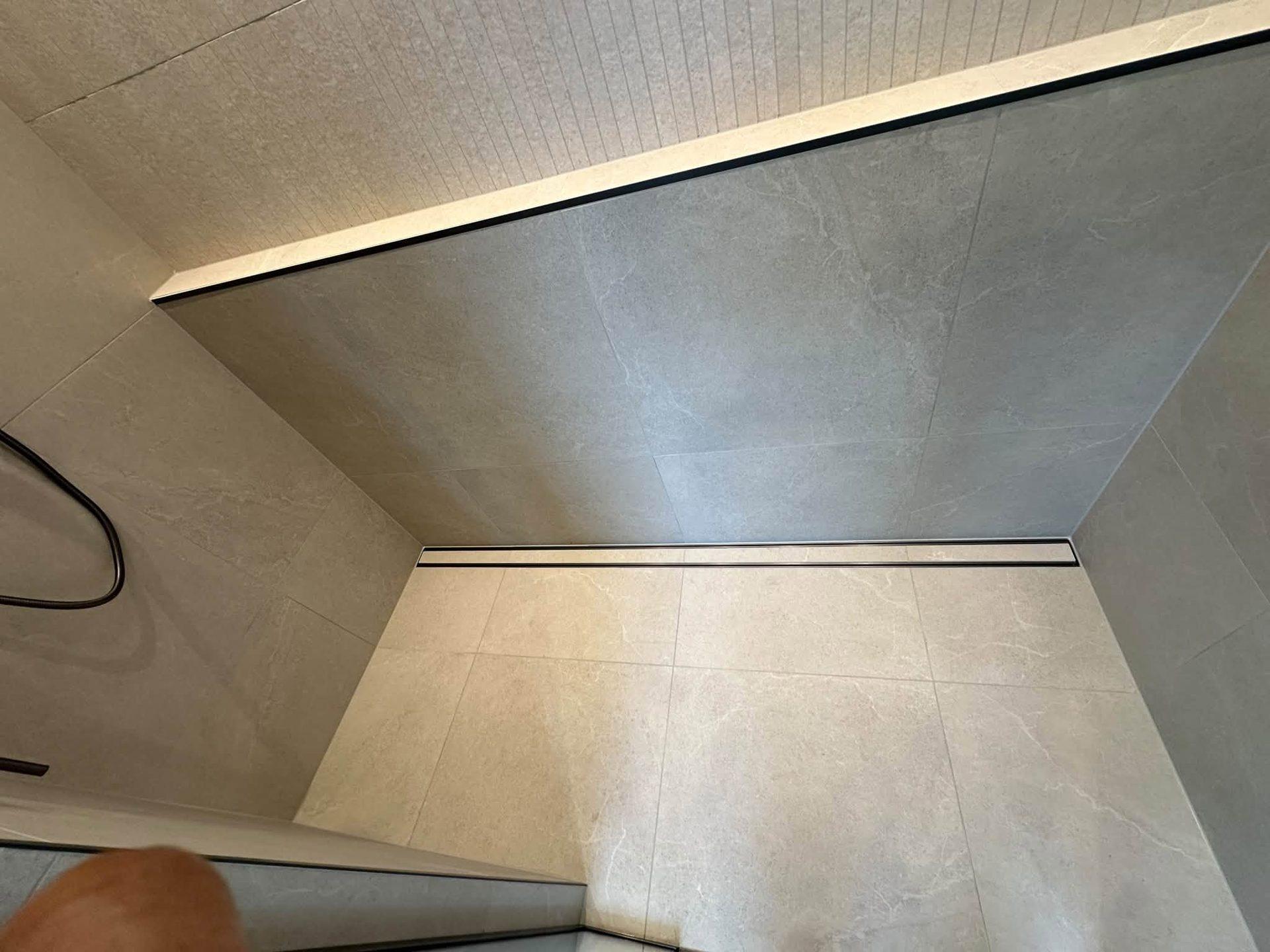 Level-entry shower floor tiling detail