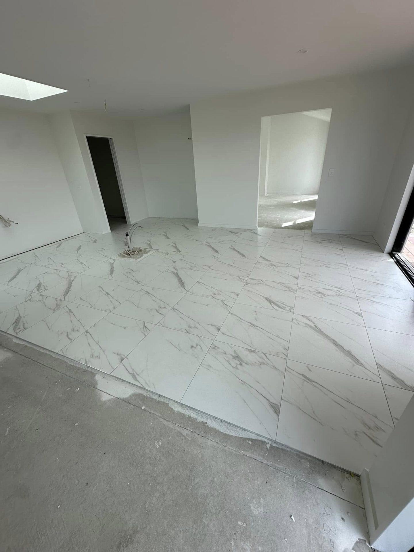 Marble-look floor tiles in an open-plan area