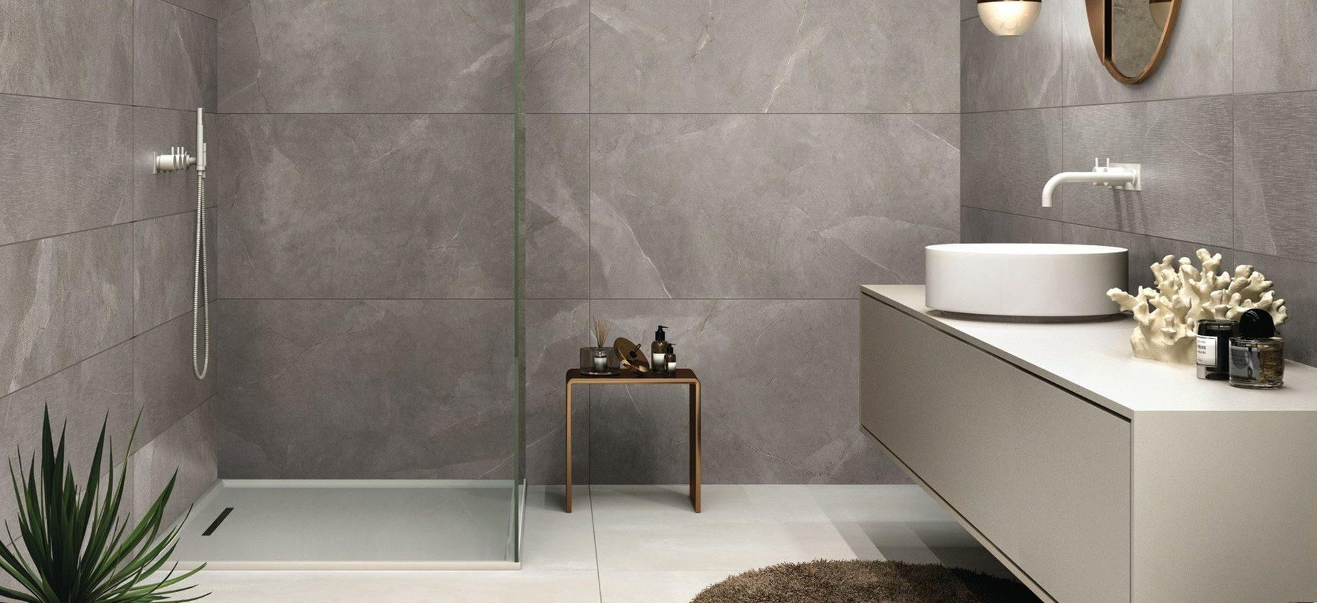 Modern bathroom with grey large-format tiles