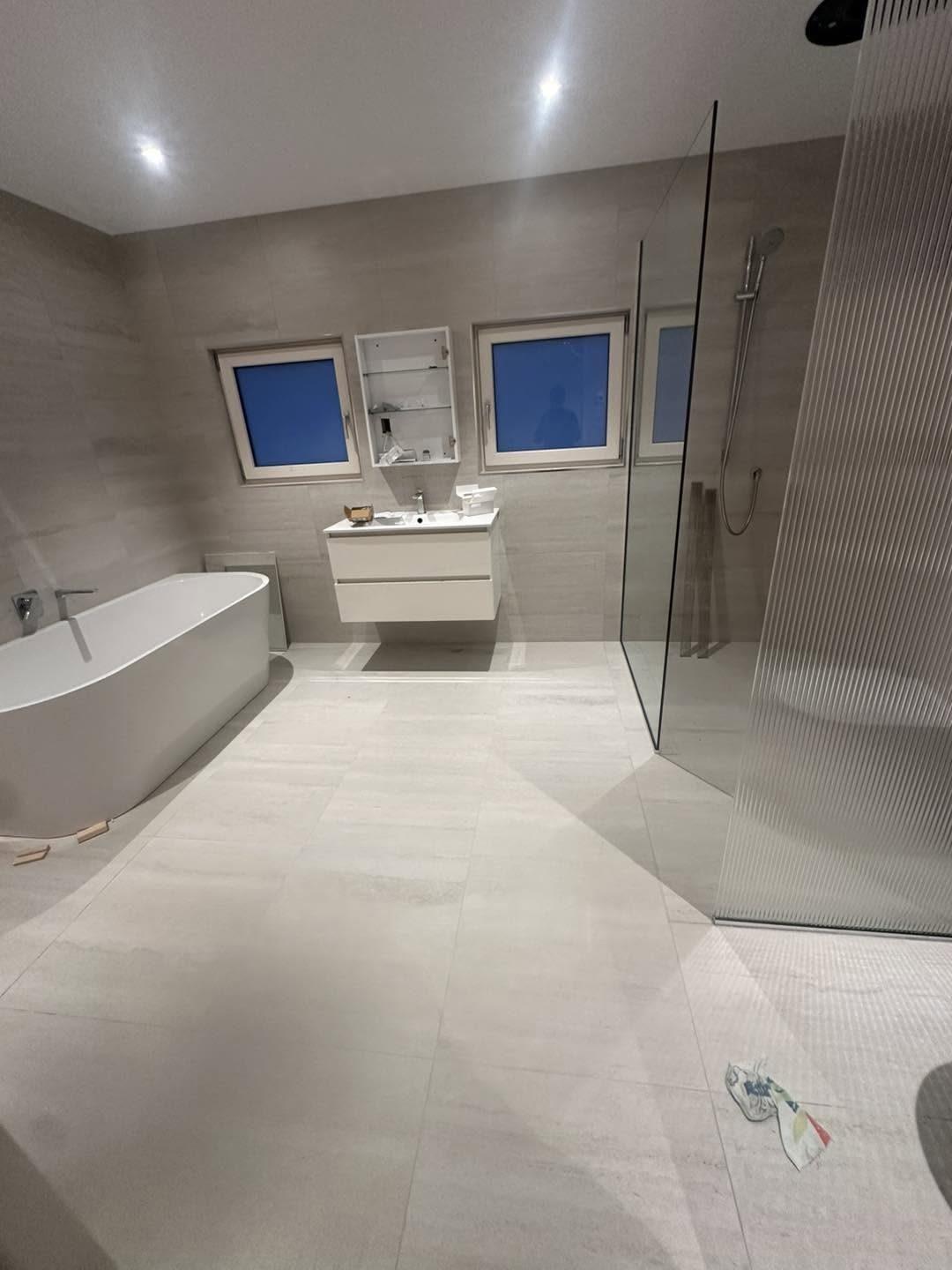 Bathroom renovation with freestanding bath and walk-in shower