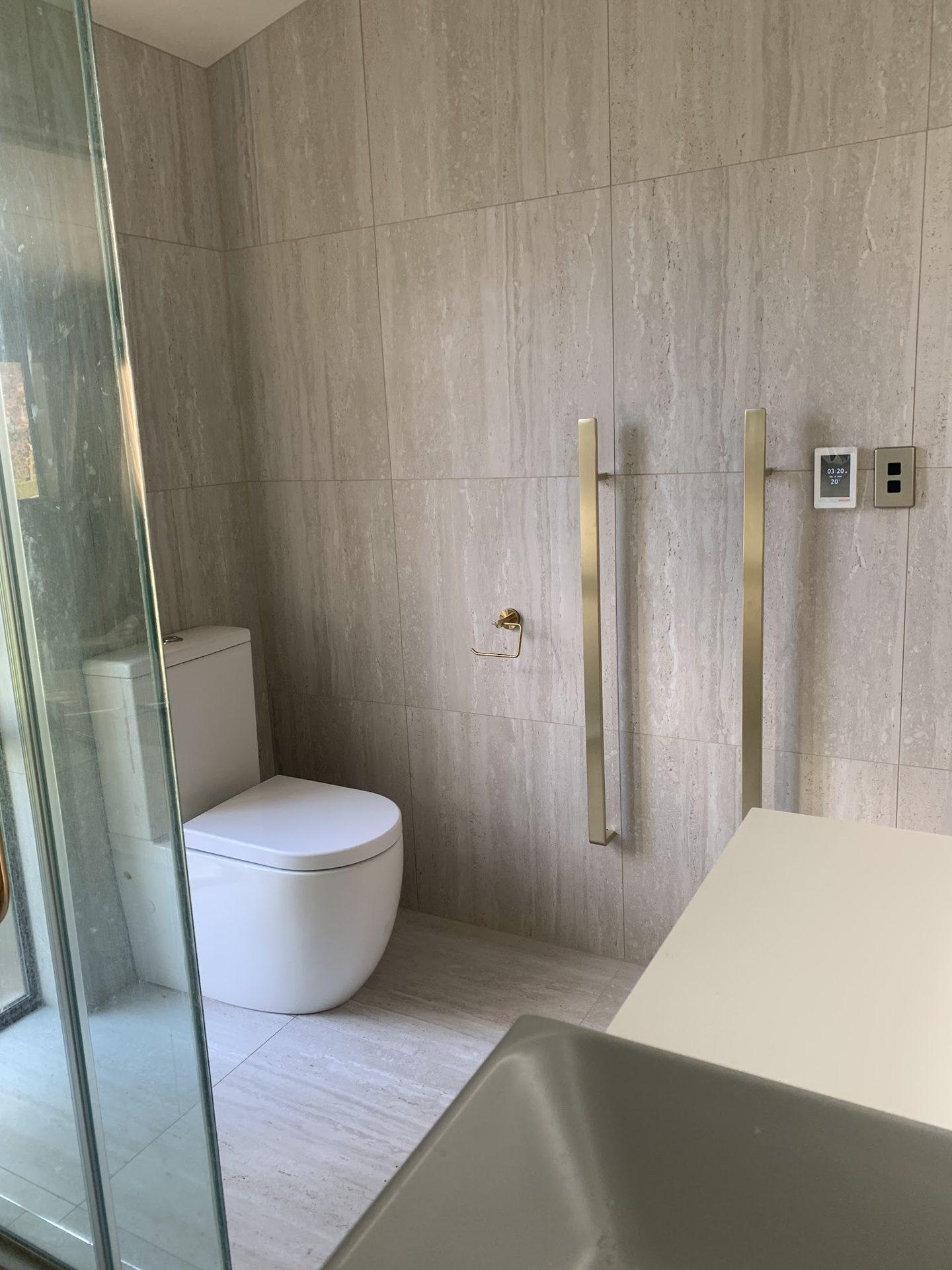 Ensuite shower re-tiled after a leak repair